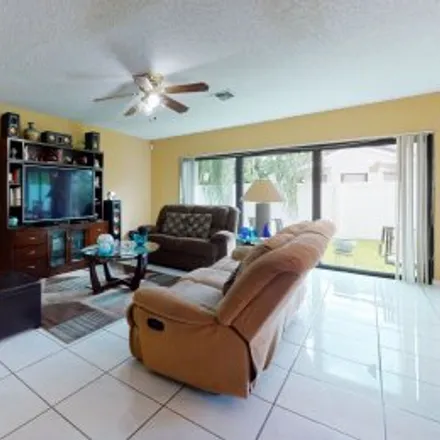 Buy this 4 bed apartment on 2743 Southwest 179Th Ter in Silver Lakes, Miramar