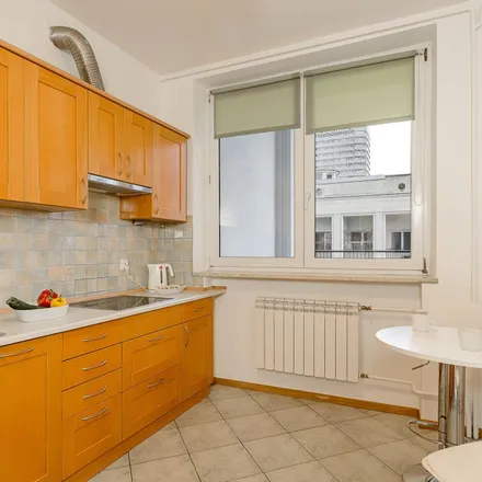 Rent this 3 bed apartment on Marszałkowska 140 in 00-061 Warsaw, Poland