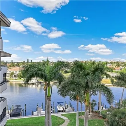 Buy this 2 bed condo on Bayside Court in Marco Island, FL 33937