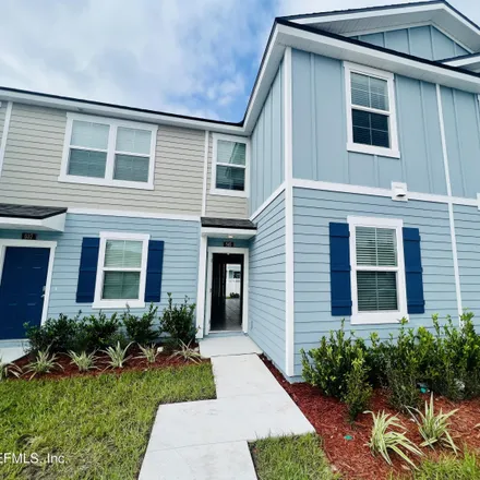 Rent this 3 bed townhouse on Cane Mill Court in Palm Valley, FL 32082