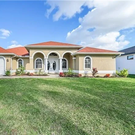 Buy this 4 bed house on 4341 Sw 25th Ct in Cape Coral, Florida