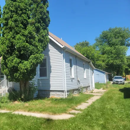 Buy this 3 bed house on 1637 Victoria Avenue in North Chicago, IL 60064