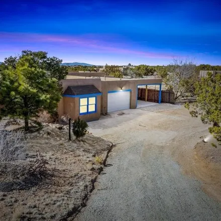 Buy this 3 bed house on 98 Jornada Way in Santa Fe County, NM 87508