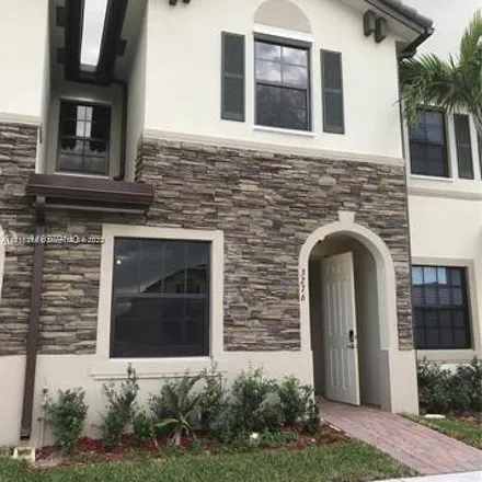 Rent this 3 bed apartment on 3276 West 92nd Place in Hialeah, FL 33018