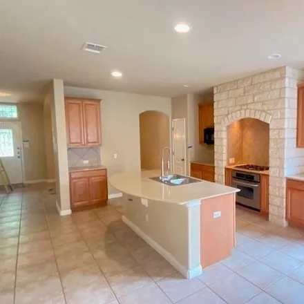 Rent this 4 bed house on 4437 Rolling Water Drive in Travis County, TX 78660