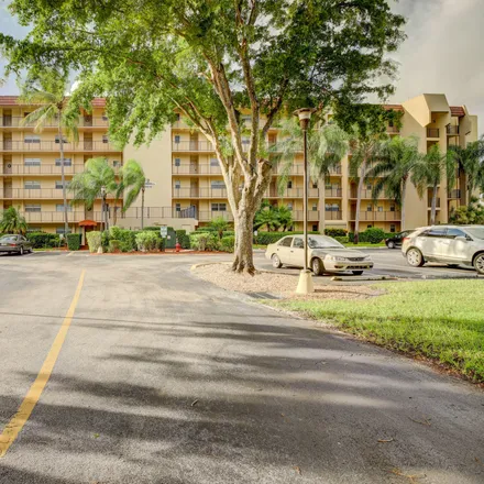 Buy this 2 bed condo on Poinciana Drive in Poincianna Place, Palm Beach County