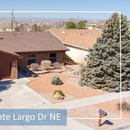 Buy this 3 bed house on 233 Monte Largo Drive Northeast in Albuquerque, NM 87123