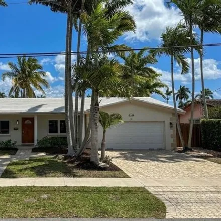 Buy this 4 bed house on 5888 Northeast 14th Way in Fort Lauderdale, FL 33334