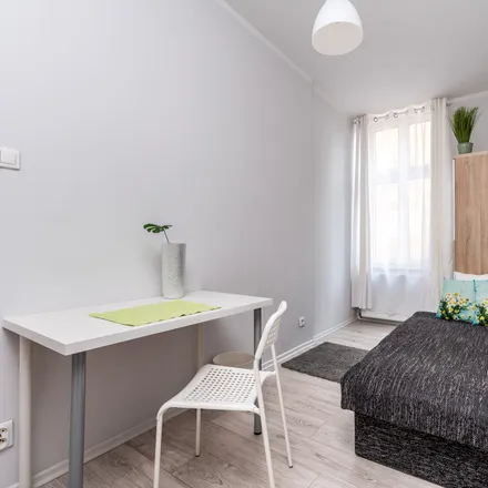 Rent this 7 bed room on Seweryna Mielżyńskiego 19 in 61-725 Poznań, Poland