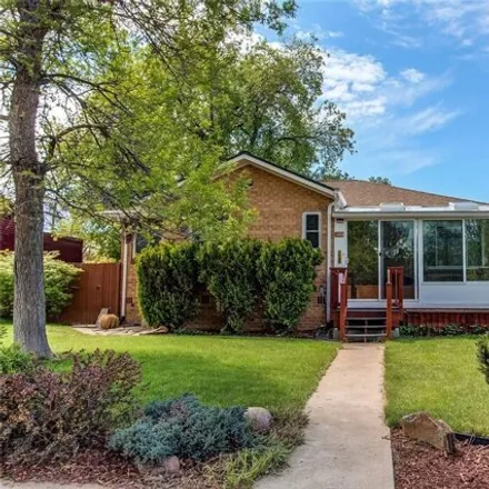 Buy this 4 bed house on 1309 Holly Street in Denver, CO 80220
