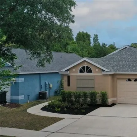 Buy this 4 bed house on 13121 Carrollwood Creek Dr in Tampa, Florida
