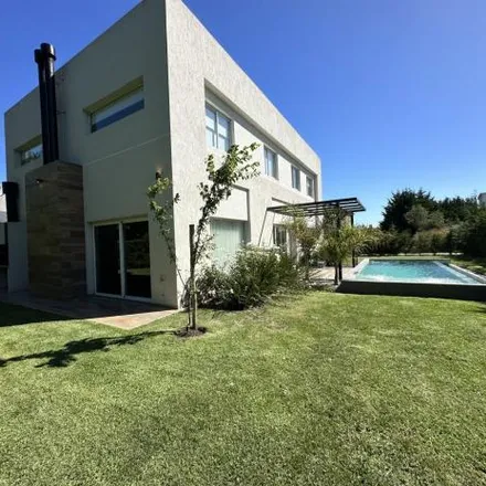 Rent this 4 bed house on Catalina Daprotis in Aeroparque, Mar del Plata