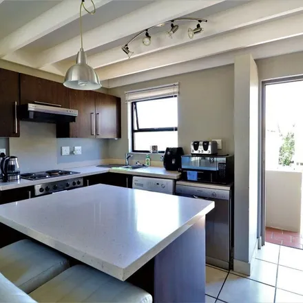 Rent this 1 bed townhouse on 12 Concourse Crescent in Paulshof, Sandton