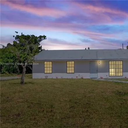 Buy this 4 bed house on 590 4th Place Southwest in Florida Ridge, FL 32962