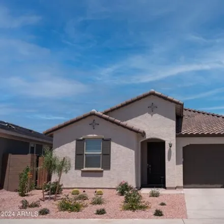 Rent this 4 bed house on West Flower Street in Buckeye, AZ