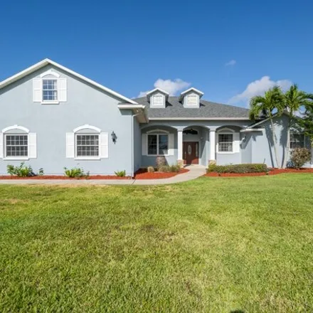 Buy this 4 bed house on 2575 S Courtenay Pkwy in Merritt Island, Florida