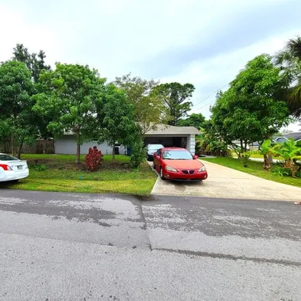 Rent this 3 bed house on 1042 Itzehoe Avenue Northwest in Palm Bay, FL 32907