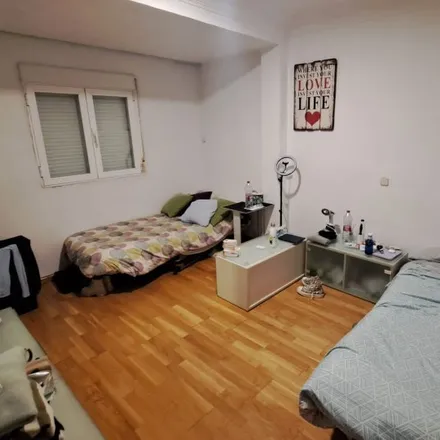 Rent this 3 bed room on Parroquia de San Basilio el Grande in Calle de Fernando Poo, 36