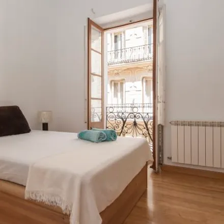 Rent this 5 bed apartment on Madrid in Santander Bank, Calle de las Postas