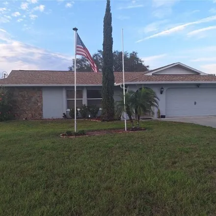 Buy this 4 bed house on 13365 Barlington Street in Spring Hill, FL 34609