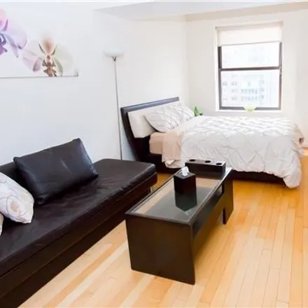 Rent this studio house on The Downtown Club in 20 West Street, New York