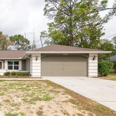 Buy this 3 bed house on 11233 Claymore Street in Spring Hill, FL 34609