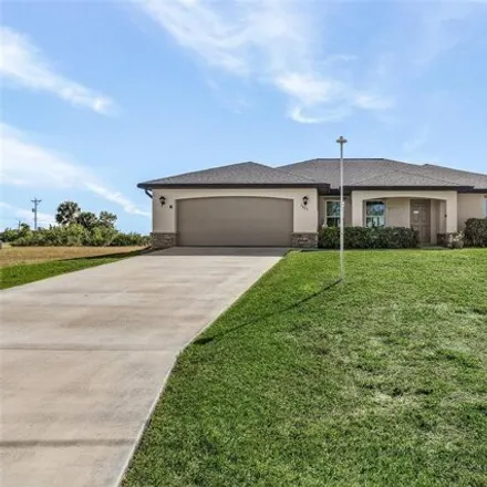 Buy this 4 bed house on 2803 Nw 3rd Ave in Cape Coral, Florida