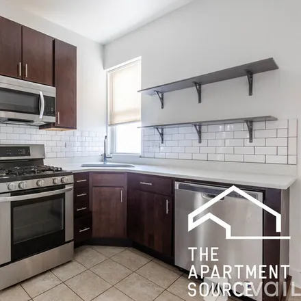 Rent this 3 bed apartment on 4736 W Armitage Ave