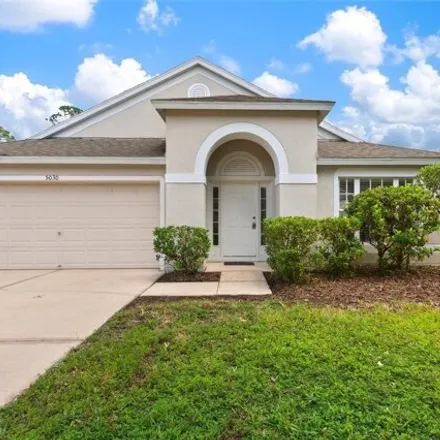 Rent this 4 bed house on 5030 Quadrangle Ct in Wesley Chapel, Florida