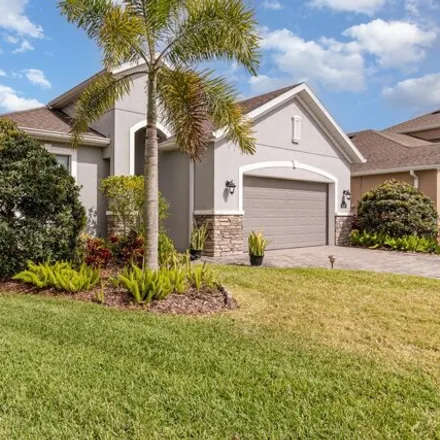 Buy this 4 bed house on 7397 Bluemink Place in Viera, FL 32940