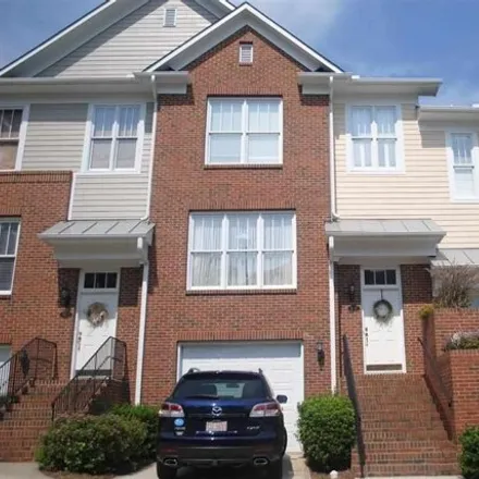 Rent this 3 bed townhouse on 6161 Bordesley Court in Raleigh, NC 27609