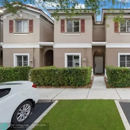 Buy this 3 bed house on 4590 Woodland Circle in Tamarac, FL 33319