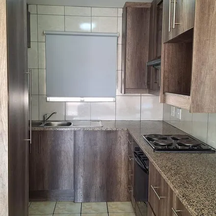 Rent this 2 bed apartment on Tipuana Avenue in Mindalore North, Krugersdorp