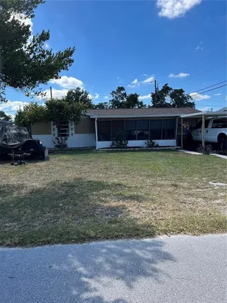 Buy this 3 bed house on 4718 Trafford Road in Holiday, FL 34690
