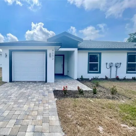 Rent this 3 bed house on 9092 Agate St in Port Charlotte, Florida