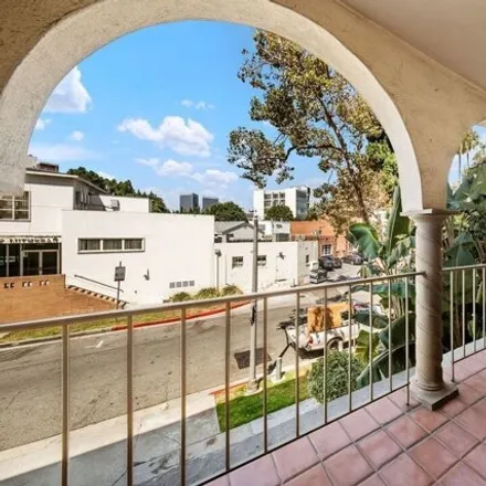 Buy this 2 bed condo on Mount Calvary Lutheran Church in South Canon Drive, Beverly Hills
