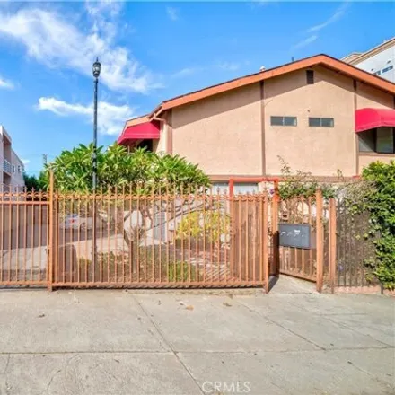 Buy this 3 bed townhouse on 959 South Manhattan Place in Los Angeles, CA 90019