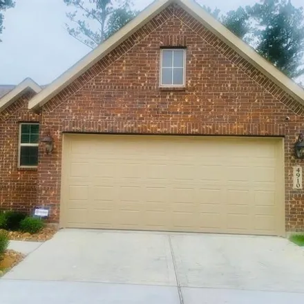 Rent this 4 bed house on Windward Falls Way in Montgomery County, TX 77345