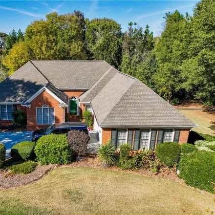 Buy this 6 bed house on 5001 Johns Creek Court in Johns Creek, GA 30022