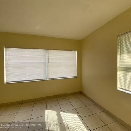 Rent this 3 bed apartment on 2382 Northwest 16th Court in Fort Lauderdale, FL 33311