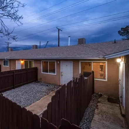Buy this 3 bed house on 1525 Amherst Drive Southeast in Albuquerque, NM 87106