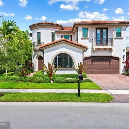 Buy this 5 bed house on 8845 W Watercrest Cir in Pompano Beach, Florida