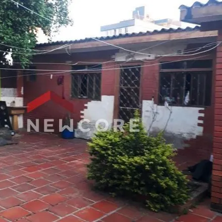 Buy this 6 bed house on Rua Valparaíso in Jardim Botânico, Porto Alegre - RS