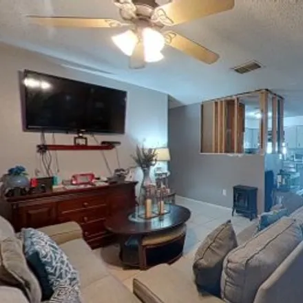 Buy this 4 bed apartment on 1494 Courtland Boulevard in Deltona Lakes, Deltona