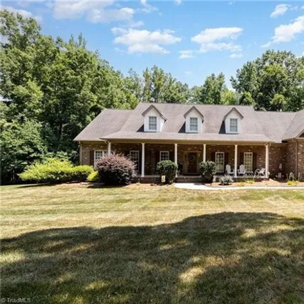Buy this 4 bed house on 7998 Witty Rd in Summerfield, North Carolina