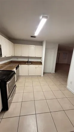 Rent this 3 bed condo on 7371 Northwest 173rd Drive in Palm Springs North, Miami-Dade County