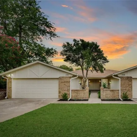 Rent this 2 bed house on 2108 Mistletoe Avenue in Fort Worth, TX 76110