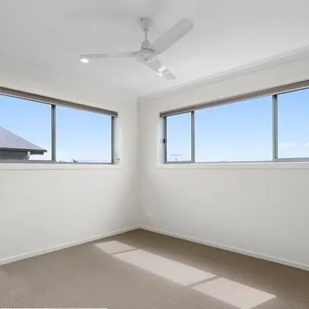 Rent this 3 bed apartment on Greenhill Street in Redbank Plains QLD 4301, Australia