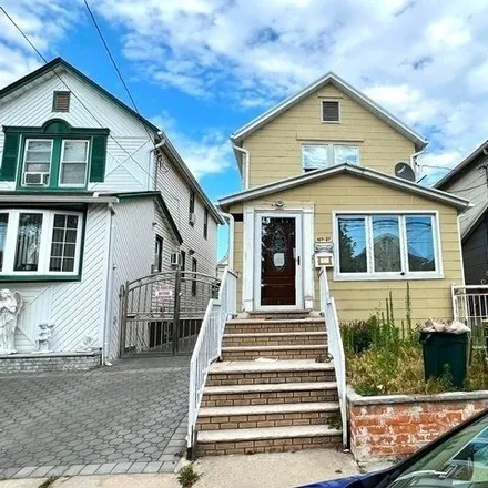 Buy this 3 bed house on 107-37 108th St in New York, 11419