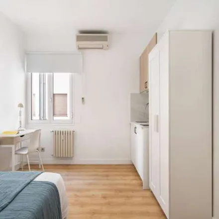 Rent this 8 bed apartment on Madrid in El Corte Inglés, Calle de Tetuán